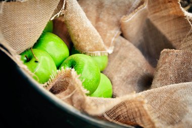 Green apples in bag; Photo by Pexels, Michelle Riach